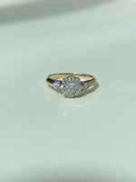 Diamond cluster ring with diamond shoulders